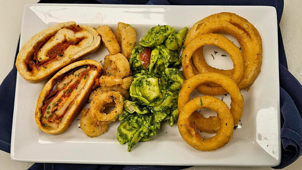 Our appetizer buffet was filled with calamari, onion rings, stromboli, and tortellini!