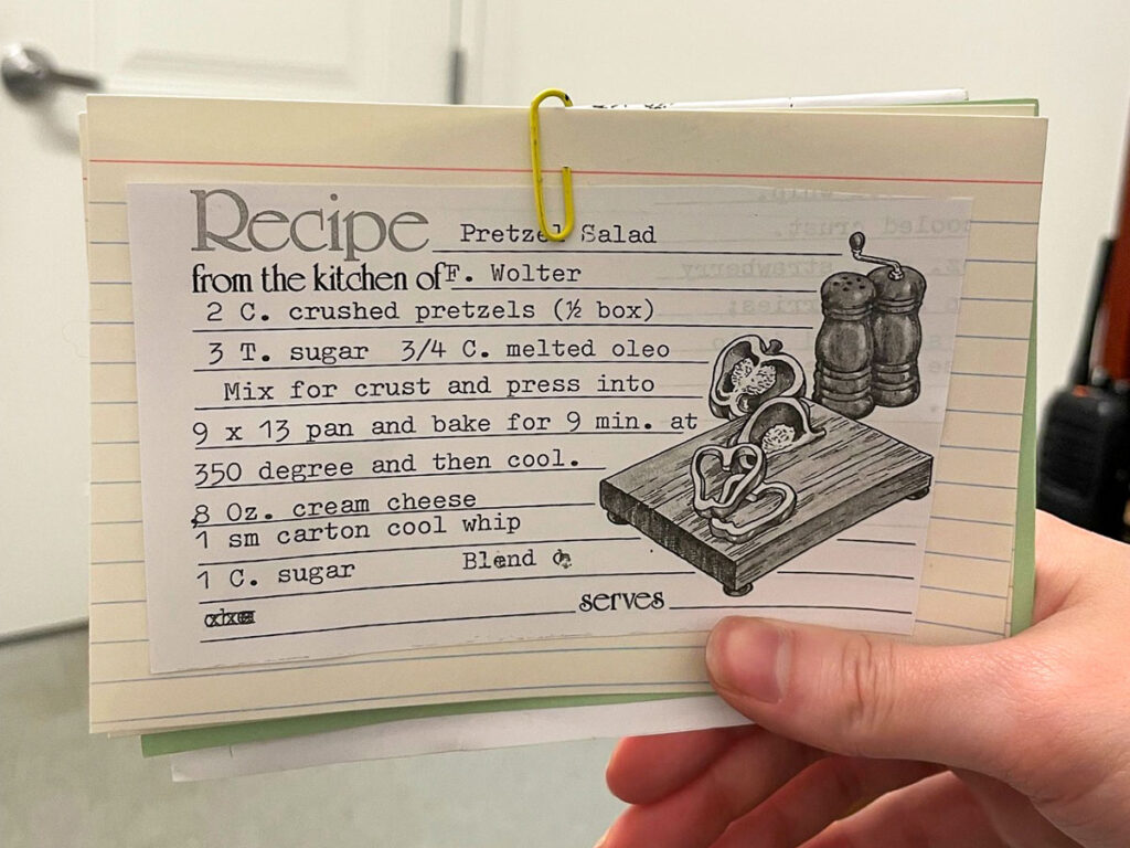 Pretzel Salad Recipe - Someone holding the printed recipe card.